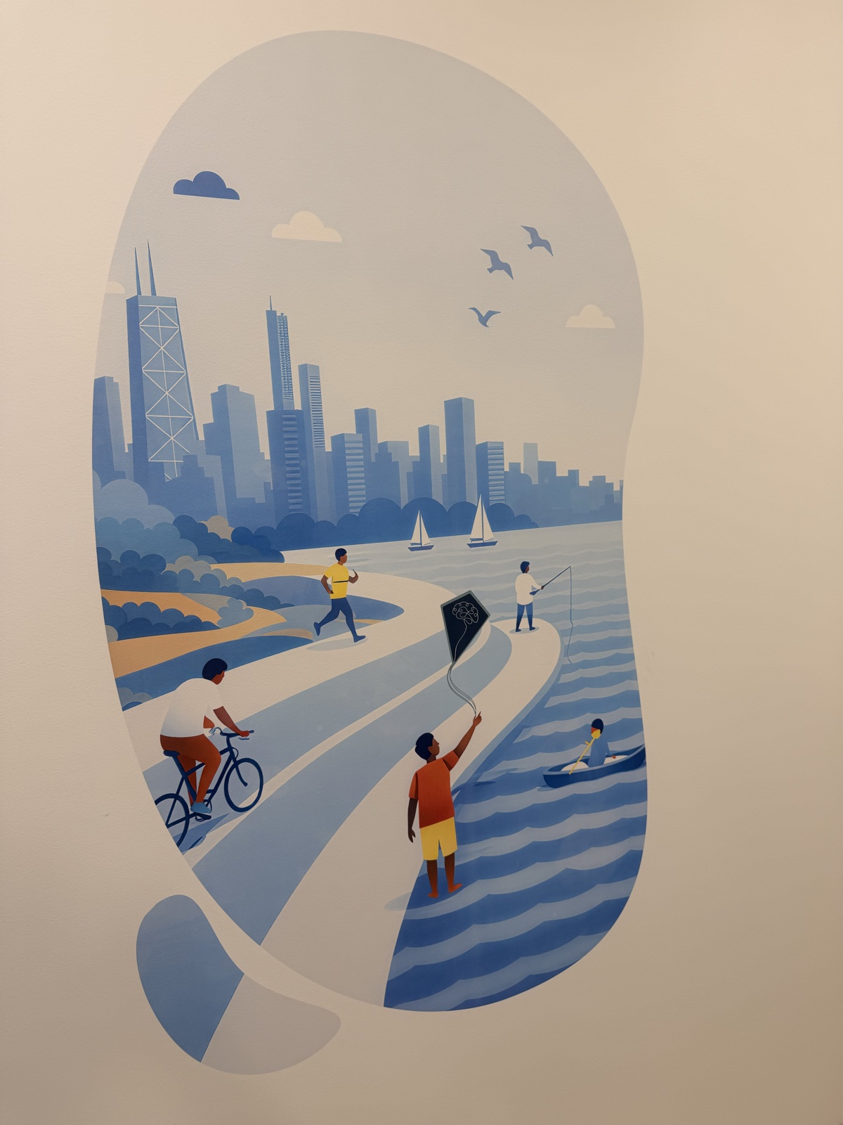 Completed blue lakefront illustration printed directly on a light wall