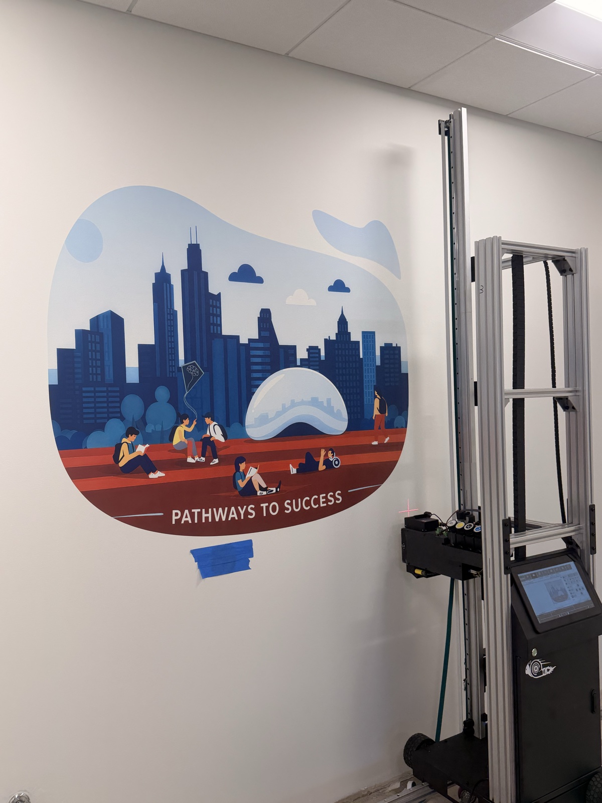 Completed Pathways to Success mural beside the vertical wall printer